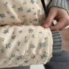 Куртка стьобана демісезонна молочна у блакитну квітку