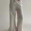 Костюм блузка та штани з рюшами бавовна молочний