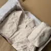 Косметичка середня махра жакард з квітами колір молочний